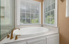 Garden Tub in Corner with Window View